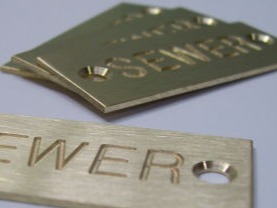 Engraved brass utility labels are corrosion ersistant