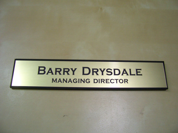 Door mounted name bar